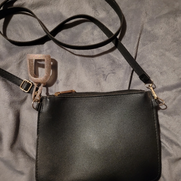 Black crossbody purse with mini glitter sanitizer attachment. - Picture 3 of 4